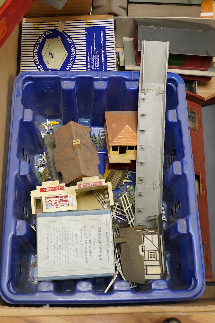 A collection of Hornby Dublo railway for 3-rail running, including three boxed locomotives; an LNER class A4 4-6-2 tender locomotive, Sir Nigel Gresley 7 (EDL1), a BR Duchess of Montrose 46232 (EDL12), and a BR class N2